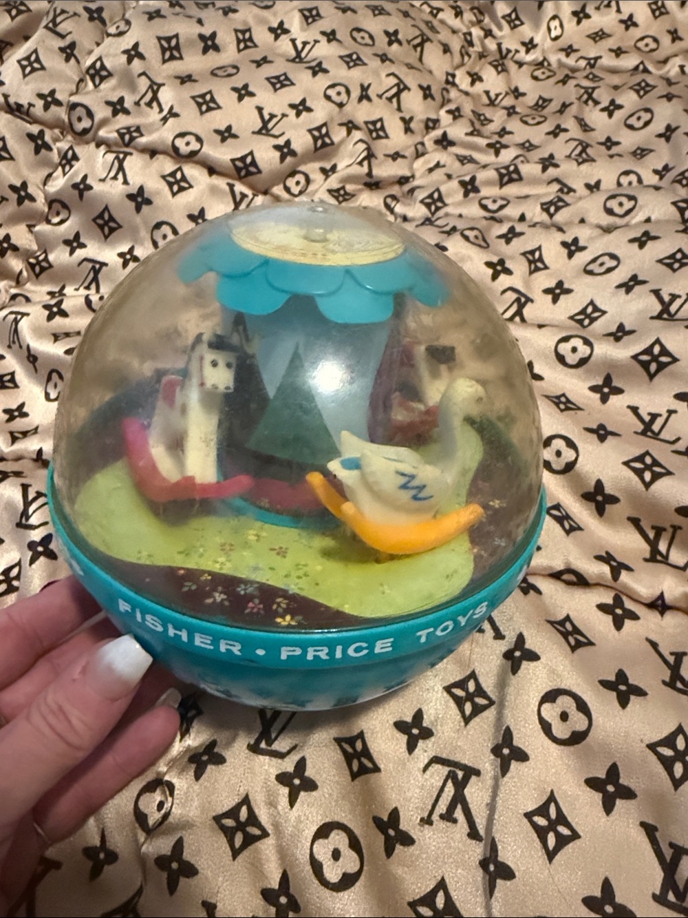 Fisher-Price Teal Dome Musical Animal roly-poly chime bowl